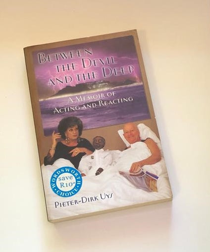 Between the devil and the deep: A memoir of acting and reacting - Pieter-Dirk Uys