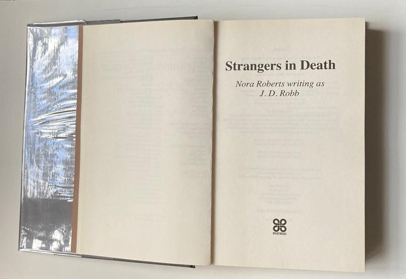 Strangers in death - J.D. Robb (In Death #26)