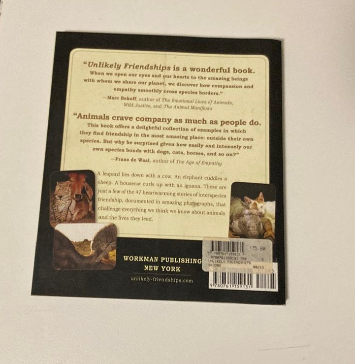 Unlikely friendships: 47 remarkable stories from the animal kingdom - Jennifer S. Holland
